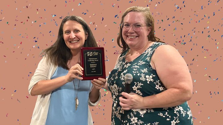 Nebraska Writing Project Director, Racheal, presenting award to Sarah Essay 