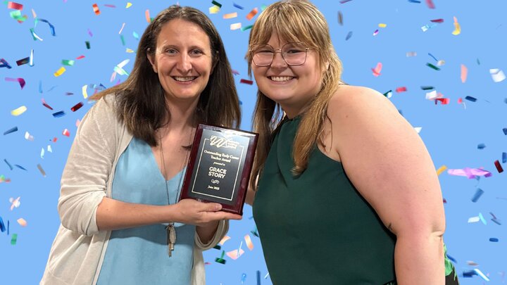 Nebraska Writing Project Directory, Racheal, presenting the award to winner, Grace Story