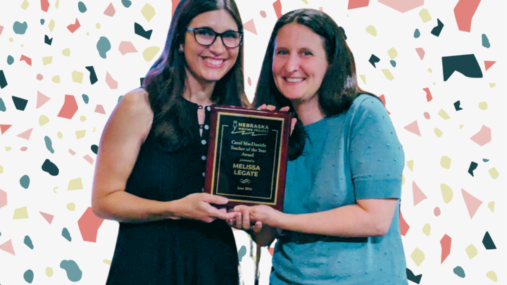 Award Winner Melissa Legate and NeWP Director Rachael Shah stand next to each other holding an award plaque