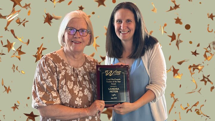 Nebraska Writing Project Directory, Racheal, presenting the award to winner, Sandra Peter